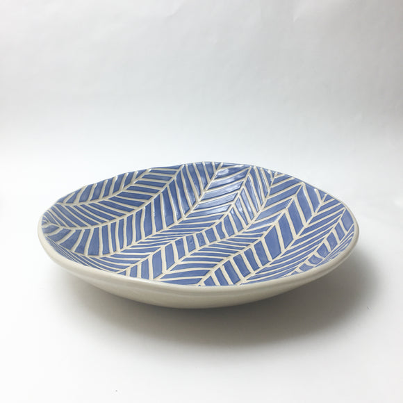 Small carved serving bowl blue and white