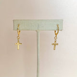Gold cross charm earrings