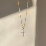 Gold diamond cross necklace