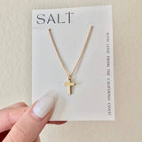 Dainty gold cross necklace