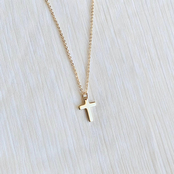 Dainty gold cross necklace