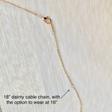 Dainty gold cross necklace