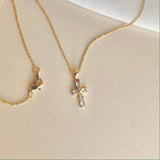 Gold diamond cross necklace